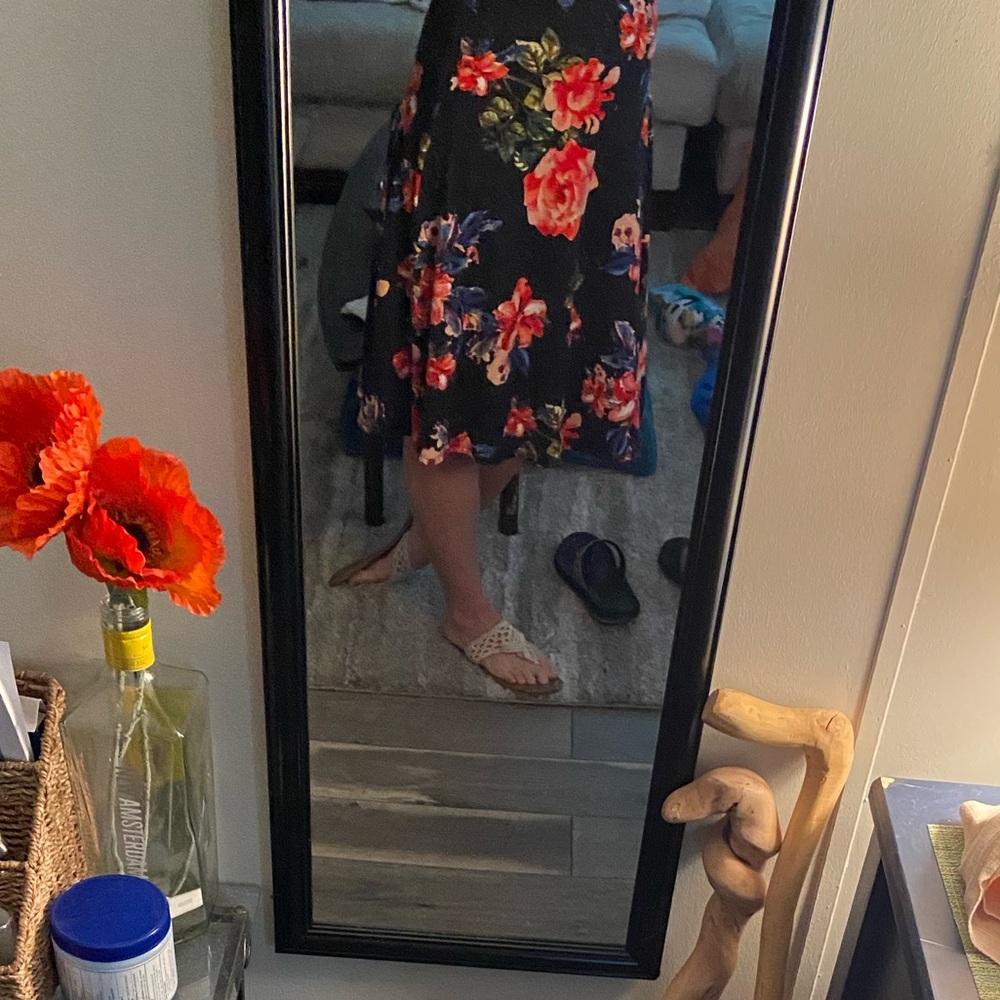 Mid length high waisted floral skirt.